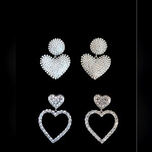 Two sets of heart earrings
